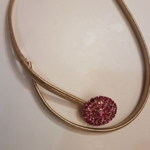 Tarina Tarantino gold stretch belt.